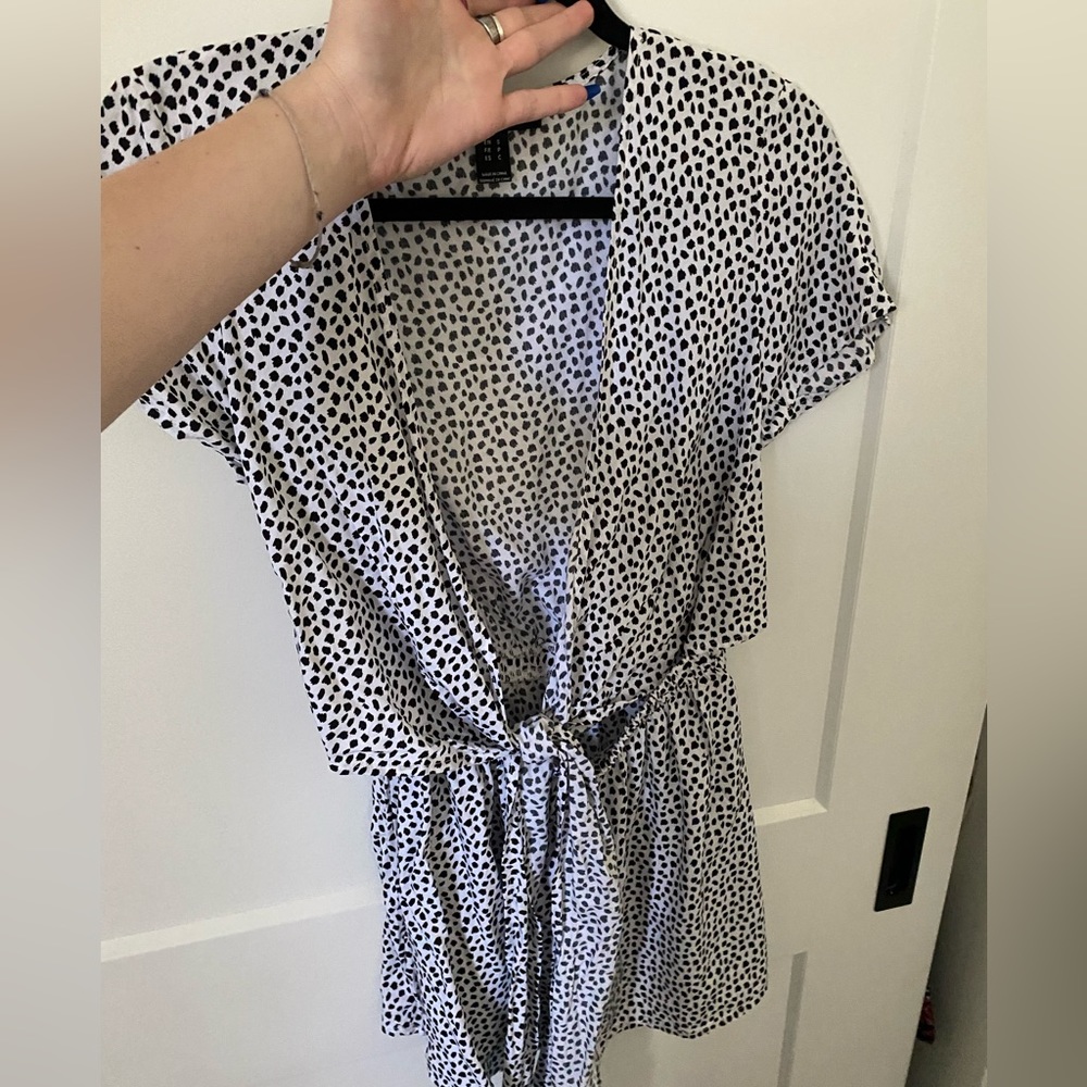 Printed shorts romper, open belly with tie top front.